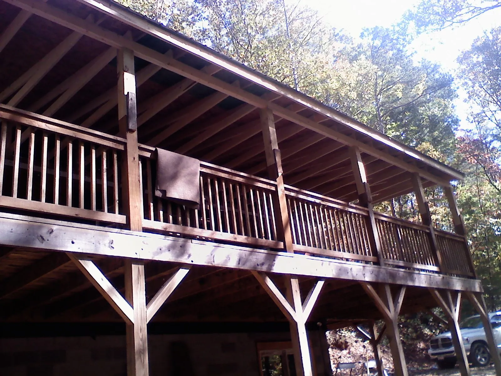 Timber framing under a new elevated porch and deck — Roof Leak Repair in La Ward by Roofing Brothers